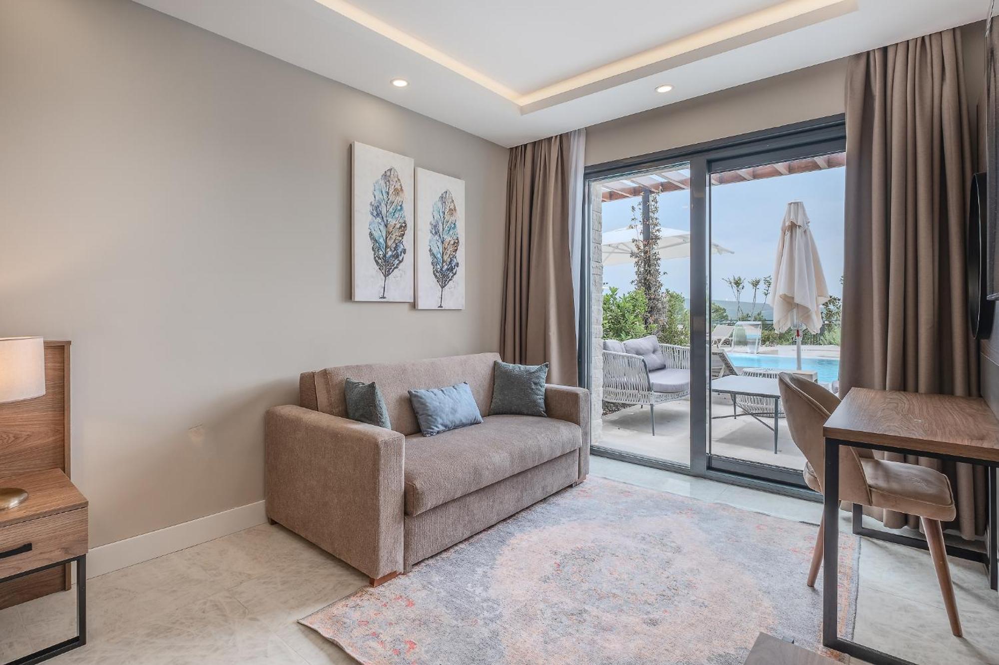 Montenegro Lodge Kavac ห้อง รูปภาพ A living room in a hotel